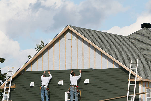 Professional Siding technician working in Powhatan Point, OH